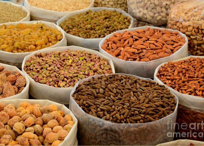 Nuts Greeting Card featuring the photograph Variety of raw nuts for sale at outdoor street market Karachi Pakistan by Imran Ahmed