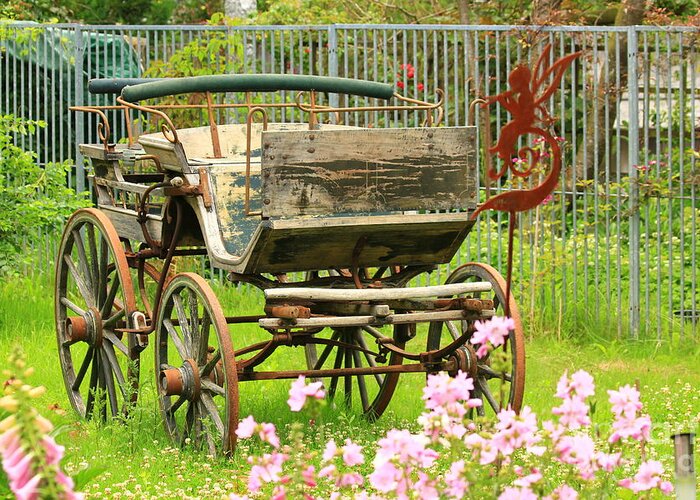 Aged Greeting Card featuring the photograph Vintage horse carriage in a flower bed by Amanda Mohler