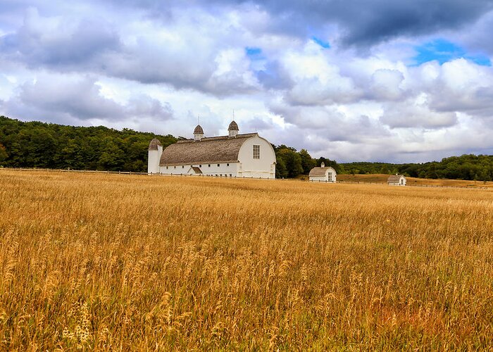 White Barn And Field Greeting Card featuring the photograph White Barn and Field by Rachel Cohen