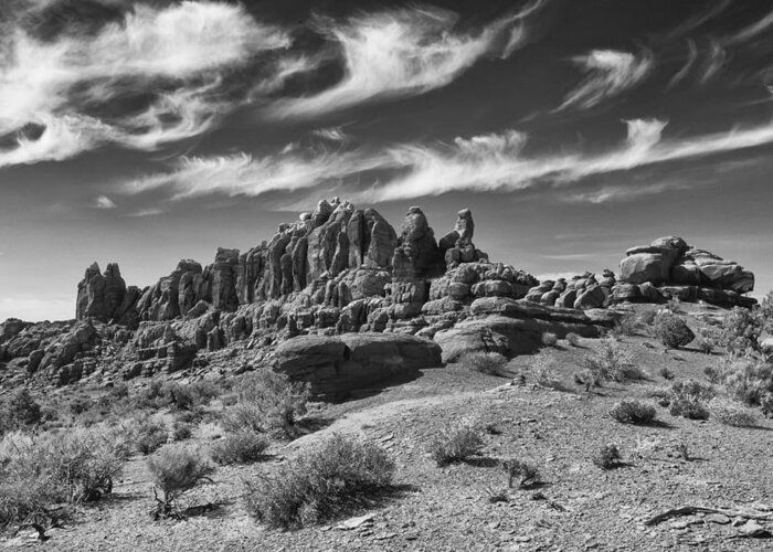 Arches National Park Greeting Card featuring the photograph Wispy Clouds Klondike Bluffs by Allan Van Gasbeck