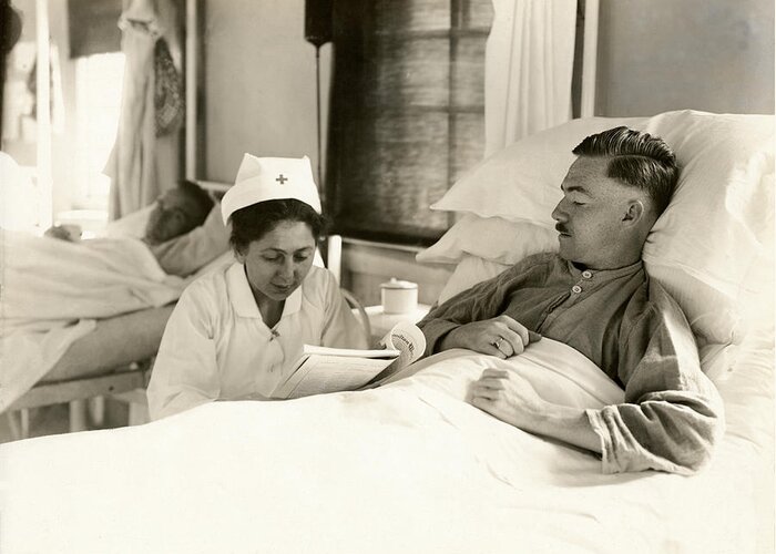 Wwi Greeting Card featuring the photograph WWI Nurse Reading to Soldier by Historic Image