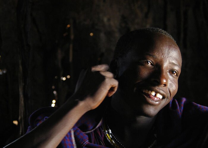 Activities Greeting Card featuring the photograph Young Maasai Warrior In The Village by Jake Norton