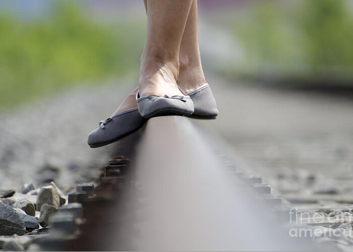 Shoes Greeting Card featuring the photograph Balance on railroad tracks #1 by Mats Silvan