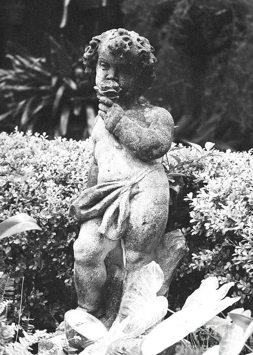 Travelpixpro New Orleans Greeting Card featuring the photograph Courtyard Statue of a Cherub French Quarter New Orleans Black and White Film Grain Digital Art #1 by Shawn O'Brien