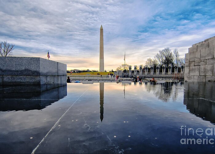 This Is A Picture Of The Washington Monument Taken From The West Side Of The World War Ii Memorial Reflecting Pool Just After A Rain Storm. The World War Ii Memorial Is Situated At The Eastern End Of The National Mall's Reflecting Pool. Greeting Card featuring the photograph Washington Monument from the World War II Memorial #1 by Jim Moore