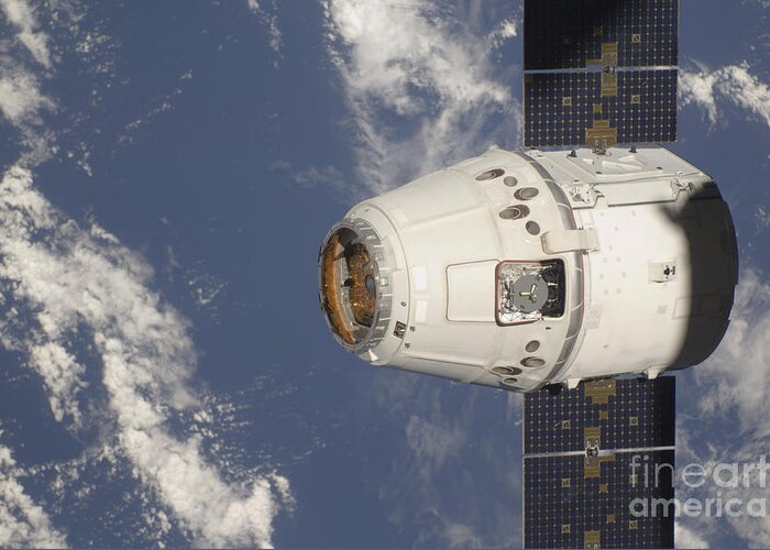 Color Image Greeting Card featuring the photograph The Spacex Dragon Commercial Cargo #4 by Stocktrek Images