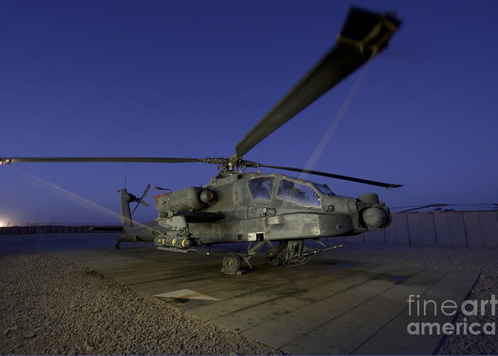 Army Greeting Card featuring the photograph A U.s. Army Ah-64d Apache Helicopter by Stocktrek Images