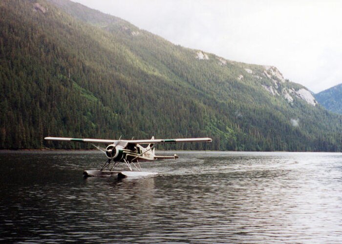 Alaska Photographs Greeting Card featuring the photograph Airplane on Lake by C Sitton