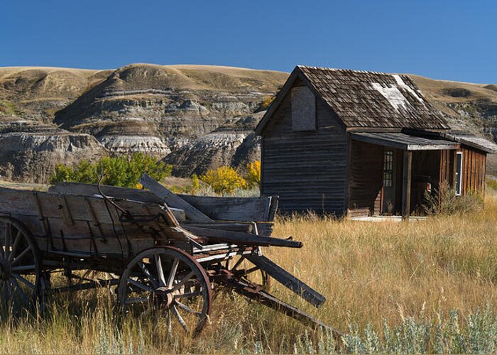 Wagon Greeting Card featuring the photograph Cabin and Wagon Alberta by David Kleinsasser