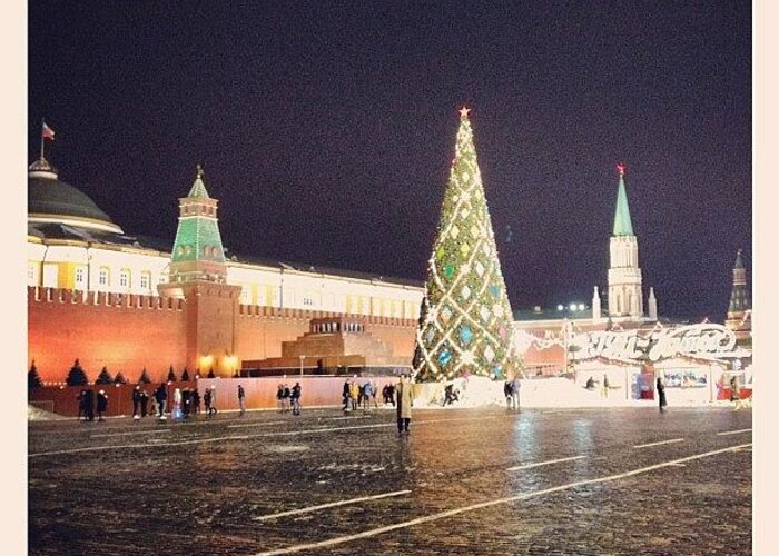  Greeting Card featuring the photograph Christmas Tree And Skating Rink On Red by Sergey Mironov