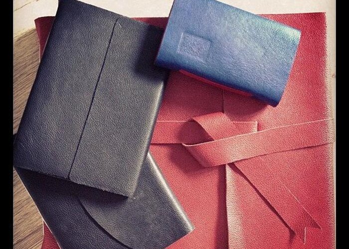  Greeting Card featuring the photograph Leather Journals Ready To Be Delivered by Khyati Dodhia