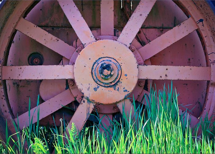 Farm Equipment Greeting Card featuring the photograph Old Spokes by Steve McKinzie