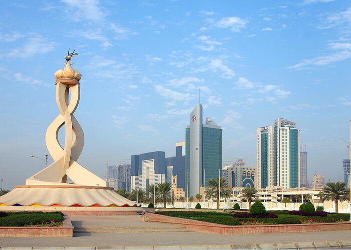 Oryx; Roundabout; Monument; Qatar; Qatar; Arabia; Commercial; District; Traffic Circle; High Rise; Construction; Architecture; Postmodern; Landscape Greeting Card featuring the photograph Oryx Roundabout in Qatar by Paul Cowan