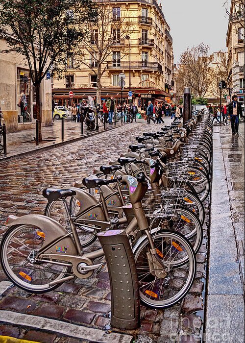 Bicycle Greeting Card featuring the photograph Paris Wheels for Rent by Bob and Nancy Kendrick