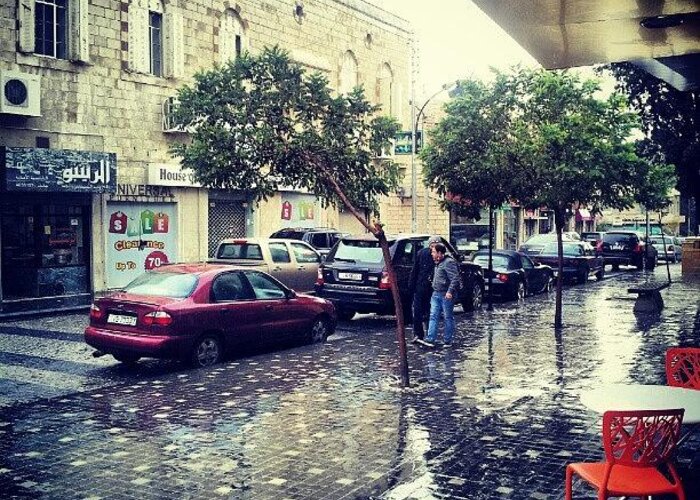 Raining Greeting Card featuring the photograph Rainbow Street #amman #jo #jordan by Abdelrahman Alawwad