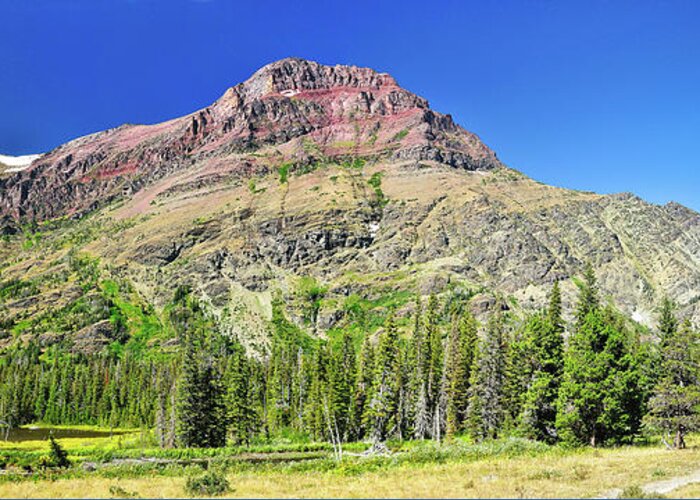 Glacier National Park Greeting Card featuring the photograph Rising Wolf Mountain by Greg Norrell