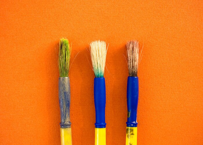 Art Greeting Card featuring the photograph Used paint brushes by Tom Gowanlock
