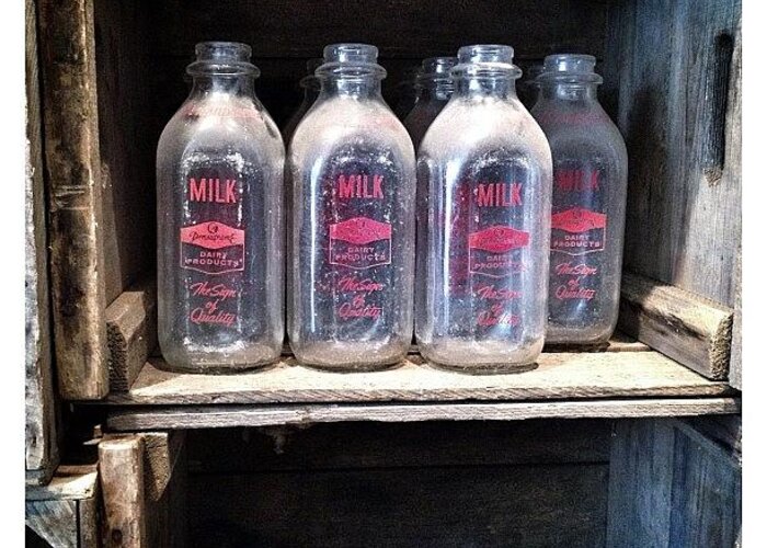 Teamrebel Greeting Card featuring the photograph Vintage Milk Bottles by Natasha Marco