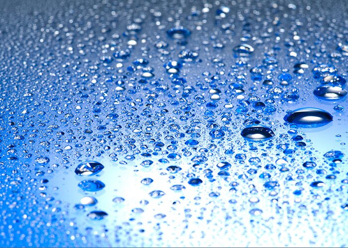 Abstract Greeting Card featuring the photograph Water drops on a shiny surface by U Schade