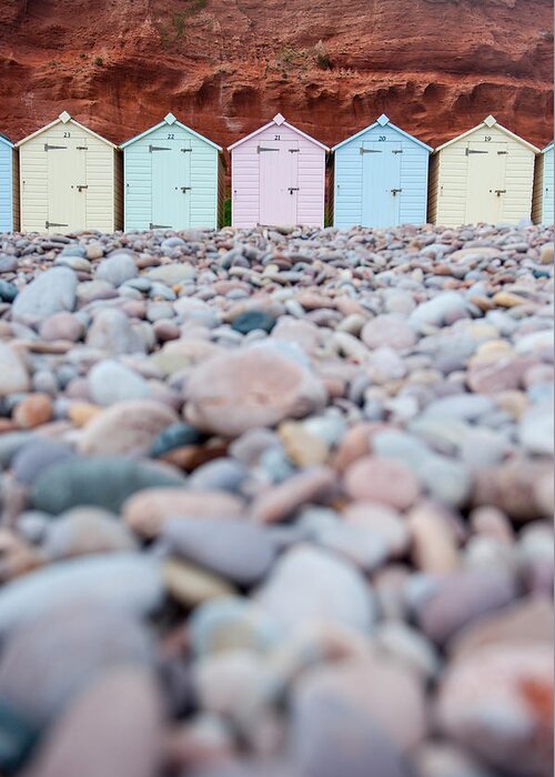 Beach Huts Greeting Card featuring the photograph Beach Huts and Pebbles by Helen Jackson