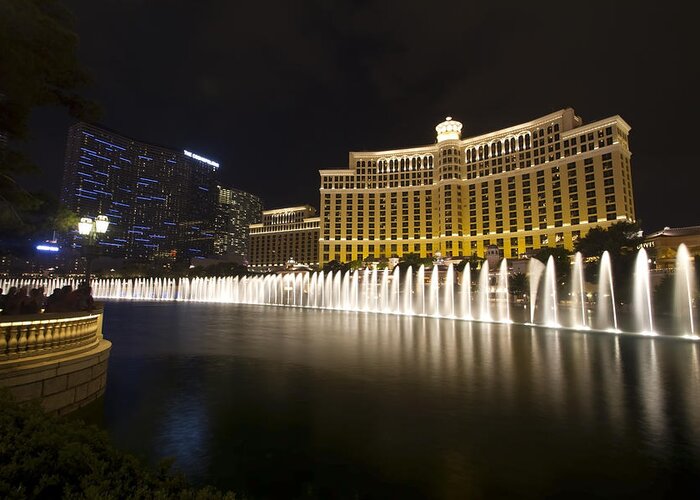 Bellagio Greeting Card featuring the photograph Bellagio Fountain in Las Vegas at night by Sven Brogren