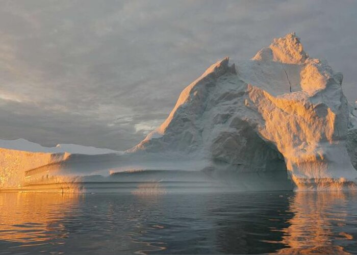 Globe Greeting Card featuring the painting An iceberg floats in Disko Bay, Greenland #1 by Celestial Images