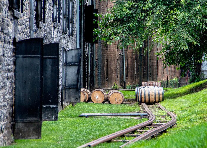 Kentucky Greeting Card featuring the photograph Whiskey Barrels on Rail #1 by John Daly