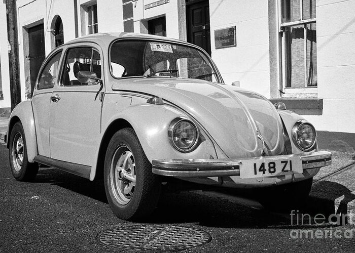 Old Greeting Card featuring the photograph Old Beetle Car Parked On A Traditional Irish Street Sligo Republic Of Ireland #2 by Joe Fox