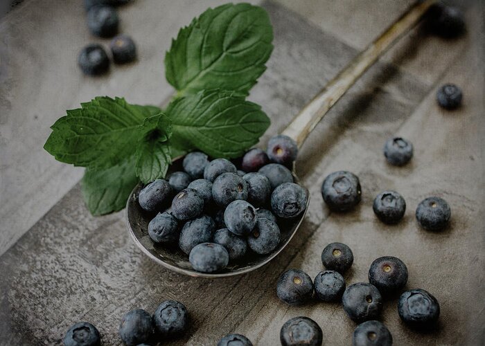Fruit Greeting Card featuring the photograph A Spoonful of Blueberries by Teresa Wilson