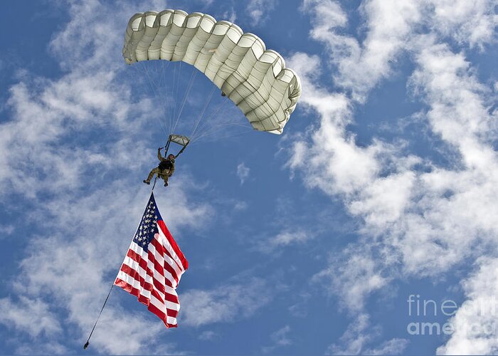 Flag Greeting Card featuring the photograph A U.s. Air Force Member Glides by Stocktrek Images
