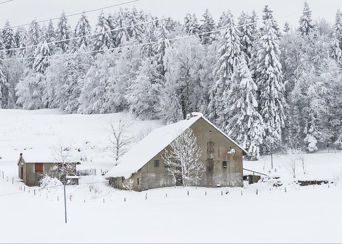 Snowy Landscape Greeting Card featuring the photograph An old farmhouse in the snow by Paul MAURICE