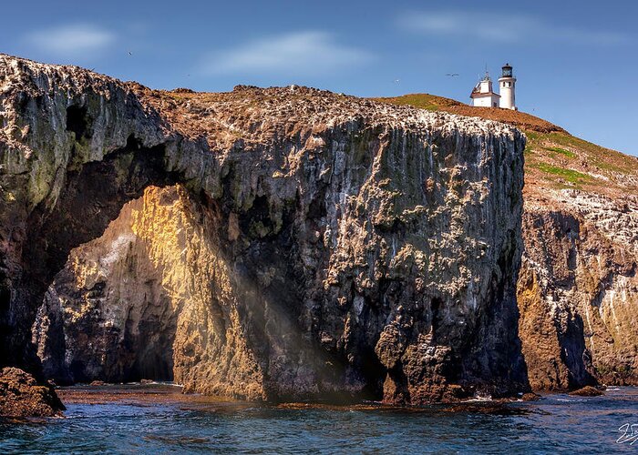 Arch Rock Greeting Card featuring the photograph Arch Rock and Lighthouse by Endre Balogh