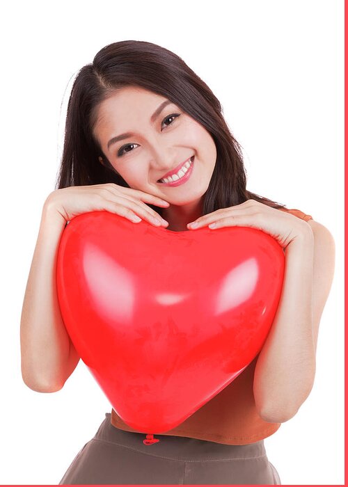Day Greeting Card featuring the photograph Asian pretty girl and a red heart on whitr islated background by Anek Suwannaphoom