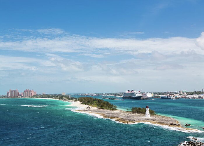 Architecture Greeting Card featuring the photograph Bahamas Lighthouse with Nassau and Resort in Background by Darryl Brooks