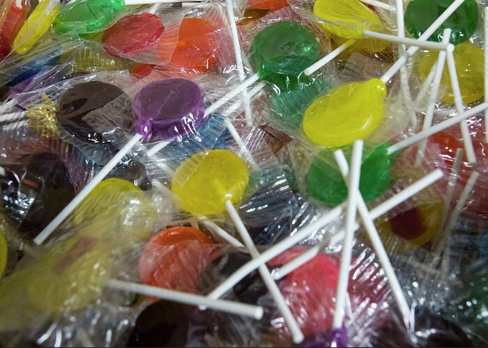 Candies Greeting Card featuring the photograph Colorful fruit lollipops by Karen Foley