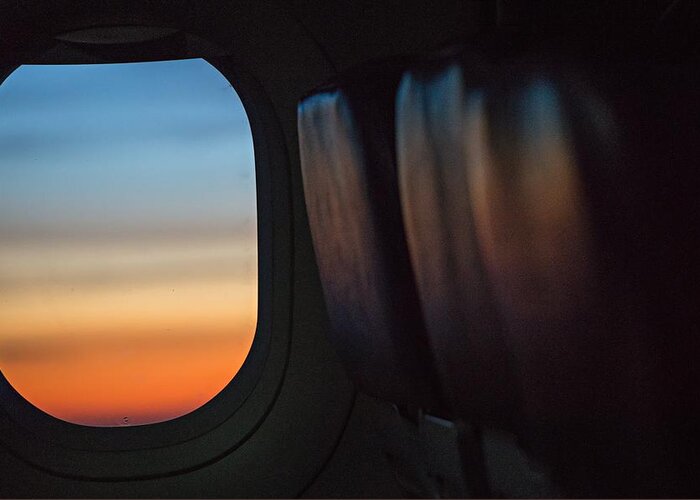 Travel Greeting Card featuring the photograph Colorful Sunrise In Airplane Window by Alex Grichenko