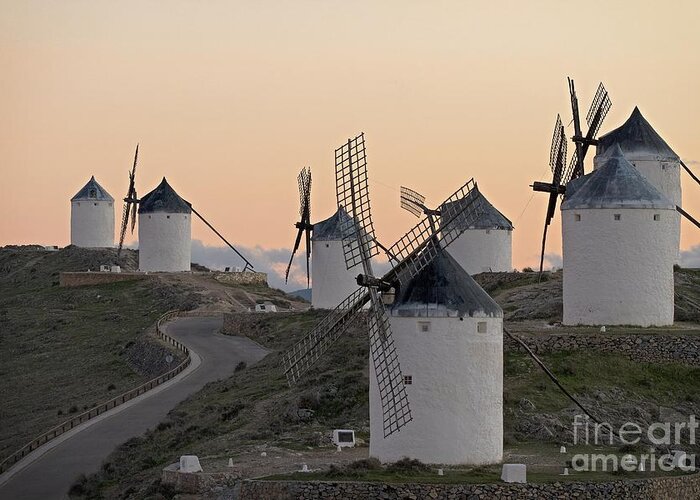 Windmills; Mills; Wind Mills; White; Architecture; Architectural; Buildings; Nostalgic; Nostalgia; Medieval; Middle Ages; Old; Antique; Ancient; History; Historical; Past; Landmark; Monument; Symbol; Scene; Scenery; Energy; Landscape; Rural; Europe; European; Spanish; Spain; Sky Greeting Card featuring the photograph Consuegra Windmills by Heiko Koehrer-Wagner