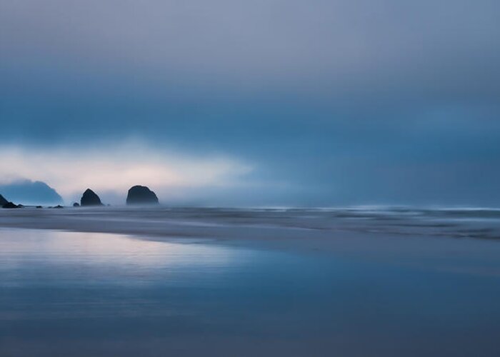 Cannon Beach Greeting Card featuring the photograph Distant Sea Stacks by Don Schwartz