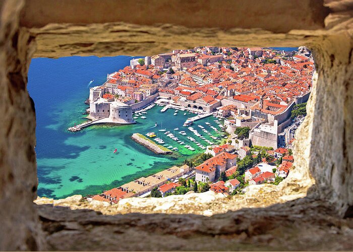 Dubrovnik Greeting Card featuring the photograph Dubrovnik historic city and harbor aerial view through stone win by Brch Photography
