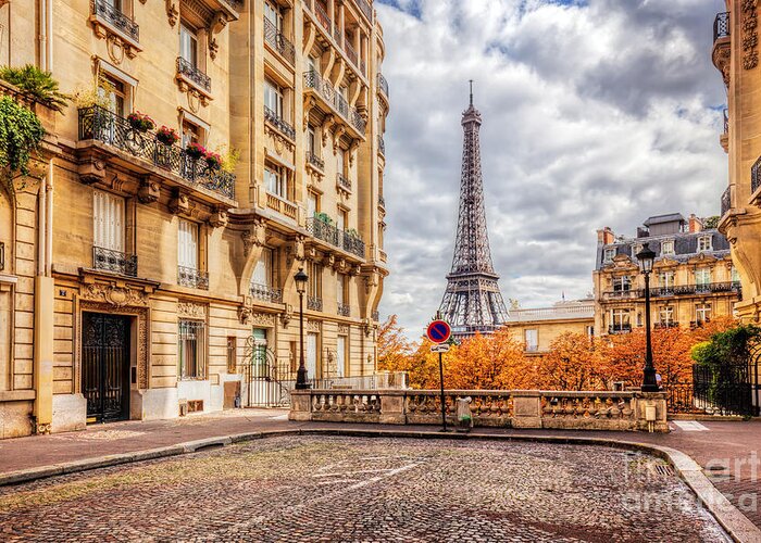 Paris Greeting Card featuring the photograph Eiffel Tower seen from the street in Paris, France. Cobblestone pavement by Michal Bednarek