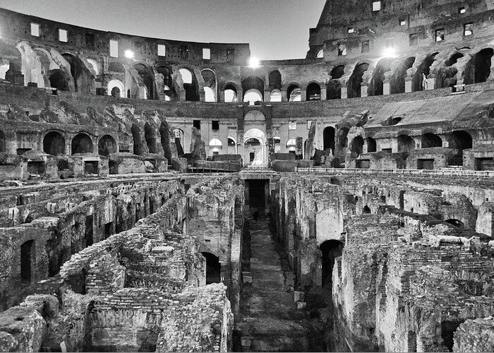 Travelpixpro Greeting Card featuring the photograph Empty Roman Colosseum Interior and Underground at Night Black and White by Shawn O'Brien