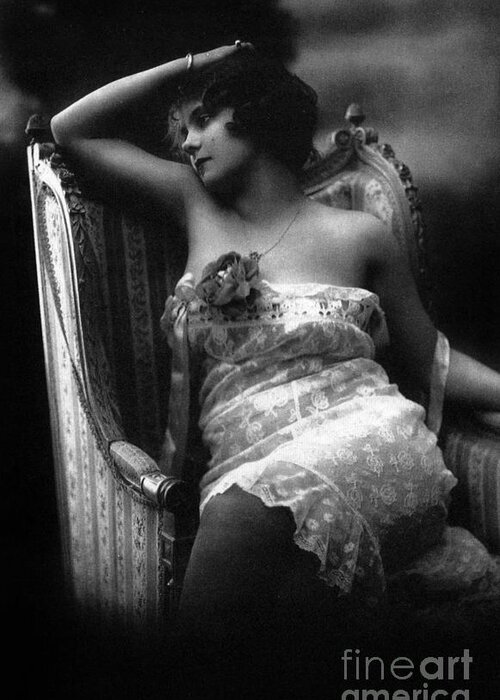 Erotic photo of a woman wearing lace lingerie in an armchair Greeting Card  by French School