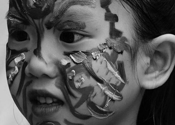Monochromatic Greeting Card featuring the photograph Face Painted Girl From Hanoi Creative by Jesper Staunstrup