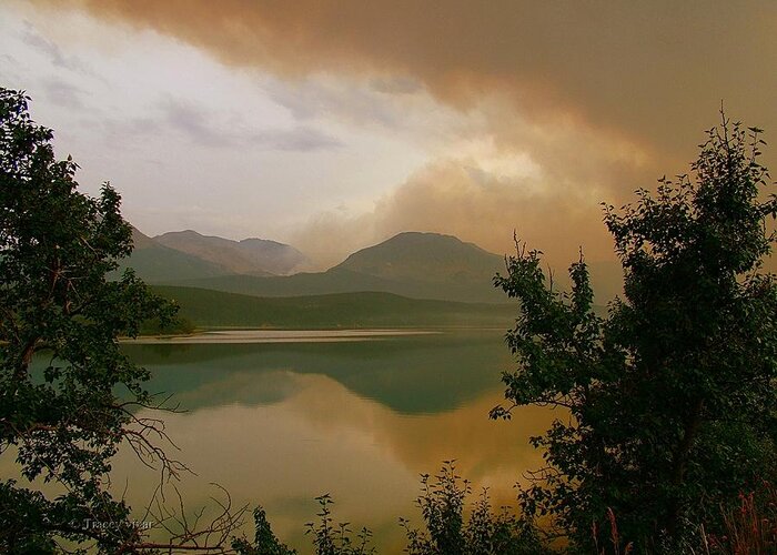 St Mary Lake Greeting Card featuring the photograph Fire Over St Mary Lake by Tracey Vivar