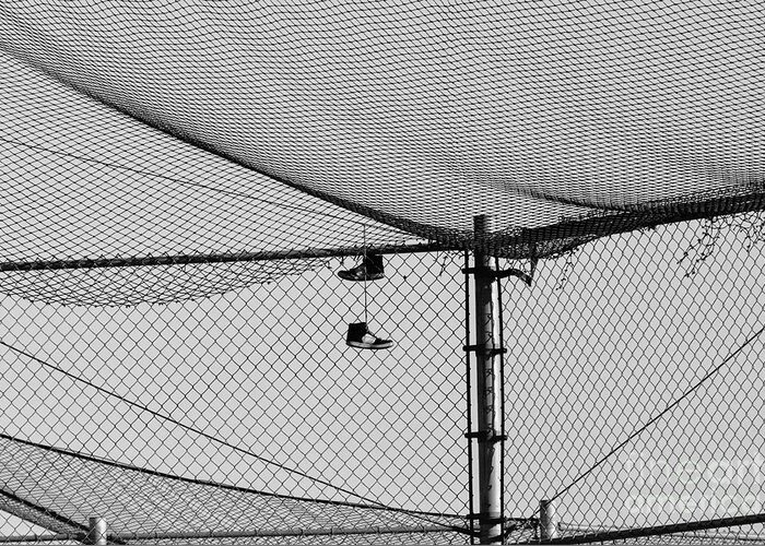 Hanging Sneakers Photograph In Black And White Greeting Card featuring the photograph Hanging Sneakers by Leah McPhail