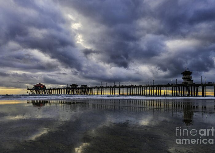 Beach Greeting Card featuring the photograph Huntington Beach Pier Sunset with Reflections by Peter Dang