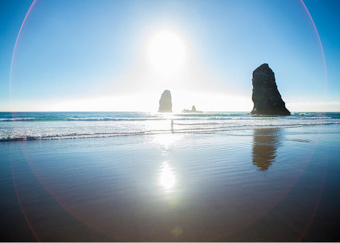 Cannon Beach Greeting Card featuring the photograph Into the Sun by Alex Blondeau