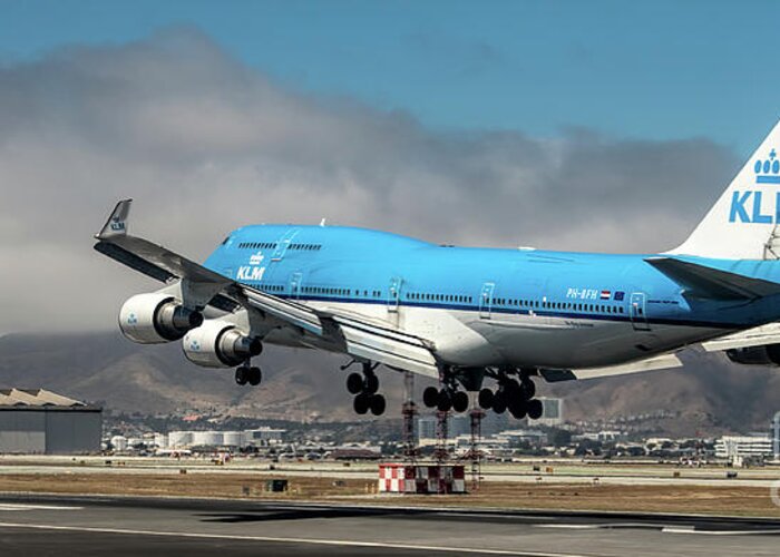 Klm Greeting Card featuring the photograph KLM Royal Dutch Airlines Boeing 747 Airplane Landing at San Francisco Airport in San Francisco, Cali by David Oppenheimer