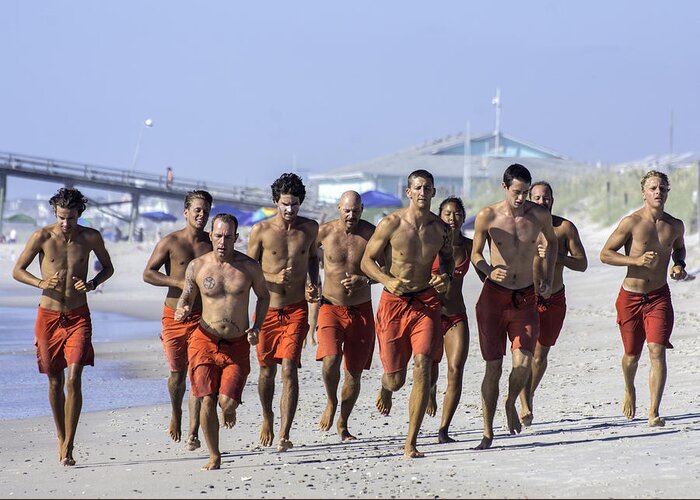  Life Guard Greeting Card featuring the photograph Kure Beach Life guards on the run by WAZgriffin Digital
