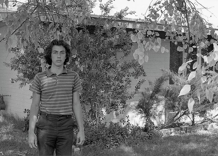 Phoenix Greeting Card featuring the photograph Man in Front of Cinder-block Home, 1973 by Jeremy Butler